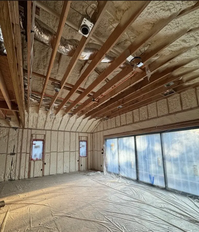 Interior walls and ceiling insulated with spray foam during new construction in Salisbury